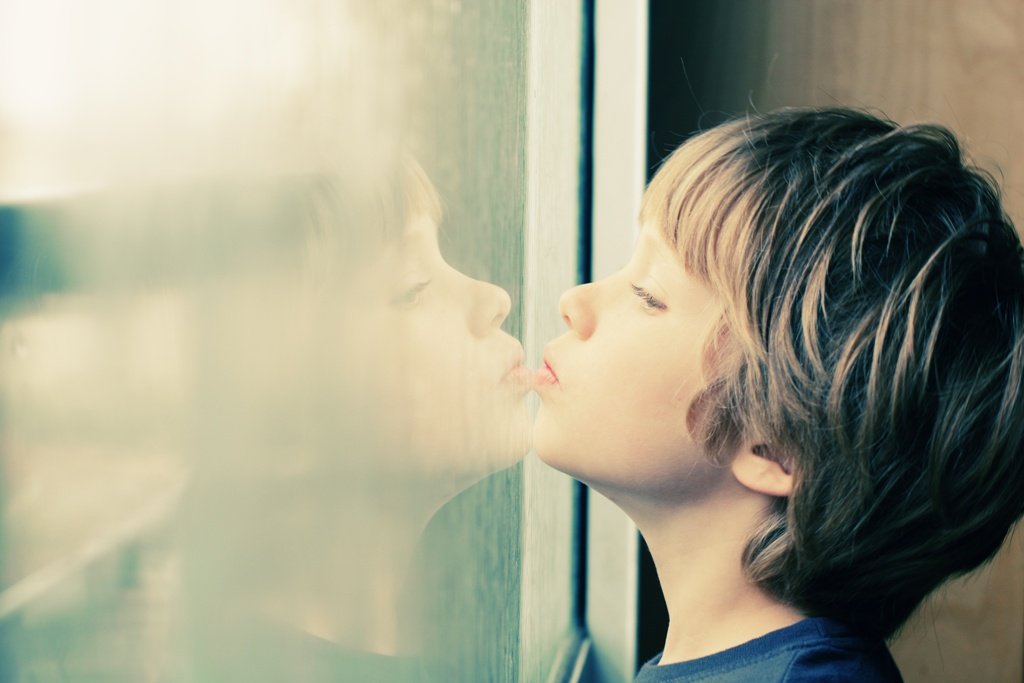 child at window