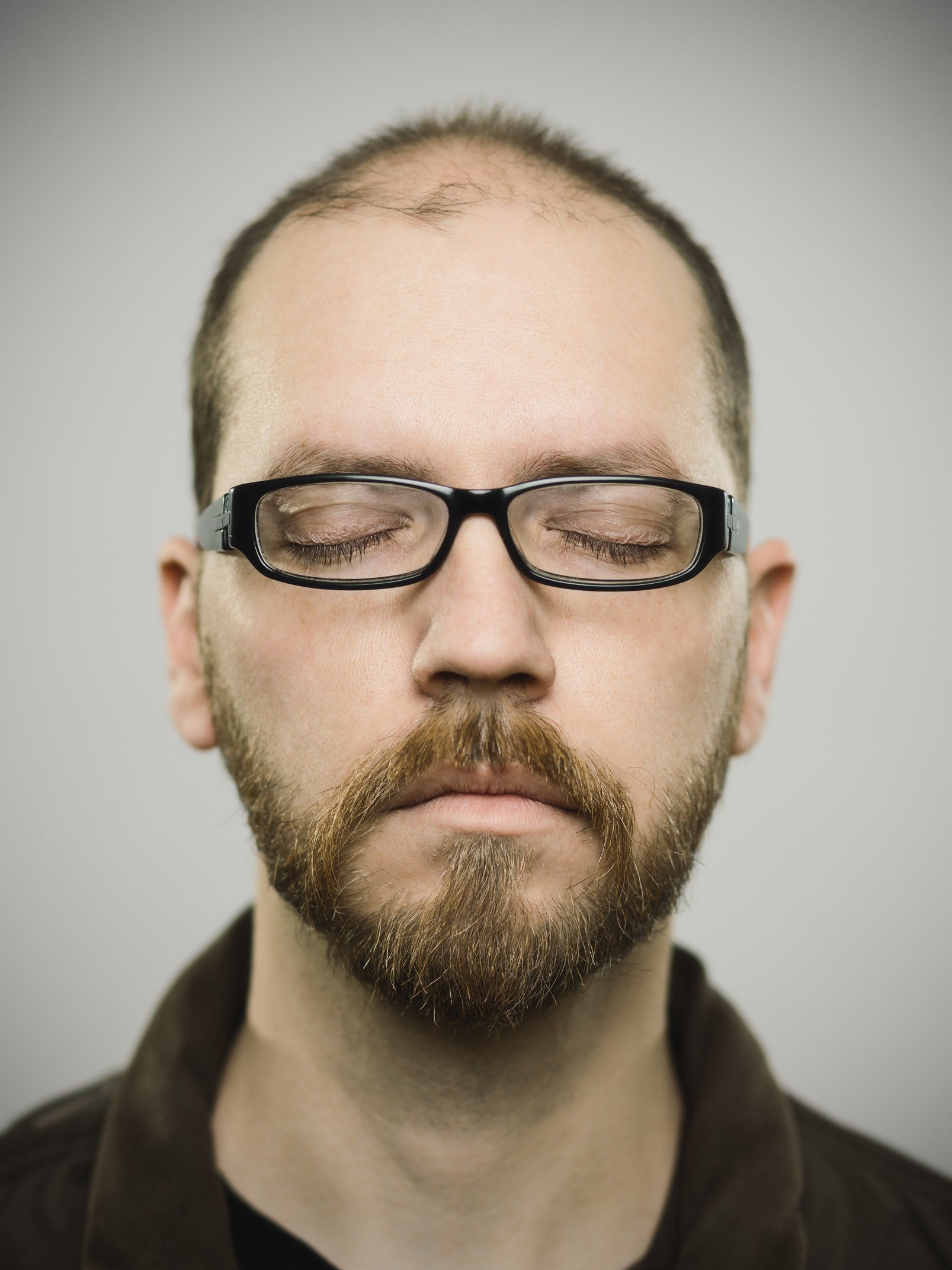 balding guy with glasses