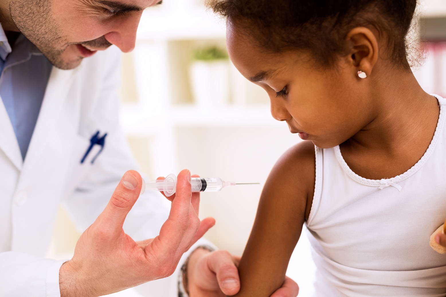 African-American girl getting a vaccine